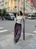 DAXUEN Cold-shoulder slim-fit knit top — model photo