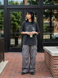 DAXUEN dark grey oversized collage graphic tee — model photo
