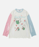 DAXUEN Distressed color-blocked long-sleeve top with graphic print