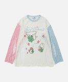 DAXUEN Distressed color-blocked long-sleeve top with graphic print