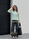 DAXUEN color-blocked long sleeve crew neck top — model photo