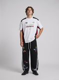 DAXUEN color-blocked white black red graphic t-shirt — model photo