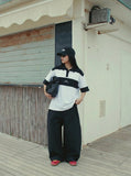 DAXUEN Color-blocked oversized polo shirt — model photo