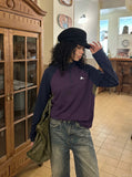 DAXUEN dark purple and olive green color-blocked long sleeve top — model photo