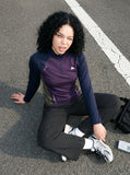 DAXUEN dark purple and olive green color-blocked long sleeve top — model photo