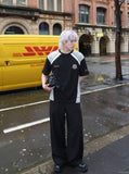 DAXUEN color-blocked t-shirt with shield patch — model photo