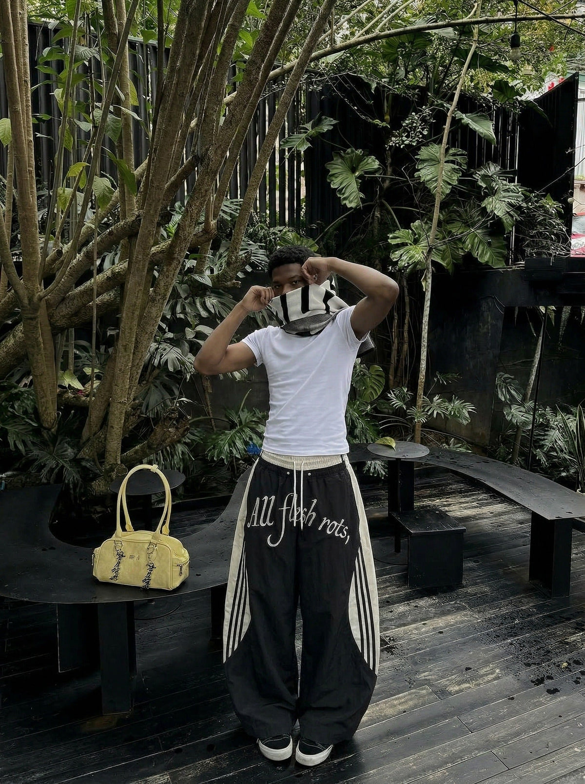 DAXUEN Color-blocked wide-leg track pants — model photo
