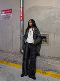 DAXUEN black and dark grey color-blocked wide-leg trousers — model photo