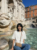 DAXUEN Embroidered short-sleeved t-shirt with colorful buttons — model photo