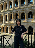 DAXUEN Embroidered short-sleeved t-shirt with colorful buttons — model photo
