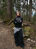 DAXUEN black relaxed jacket with angelic graphic — model photo