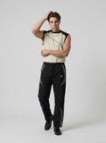 DAXUEN Men's sleeveless top with contrast color panels and geometric stitching — model photo