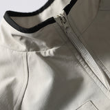 DAXUEN beige and black contrast panel bomber jacket