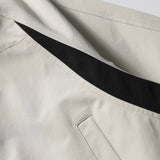 DAXUEN beige and black contrast panel bomber jacket