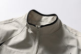 DAXUEN beige and black contrast panel bomber jacket