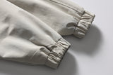 DAXUEN beige and black contrast panel bomber jacket