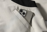 DAXUEN beige and black contrast panel bomber jacket