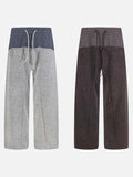 DAXUEN Wide-leg trousers with two-tone design and plaid panel