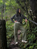 DAXUEN olive green wide-leg utility pants with contrasting waistband — model photo