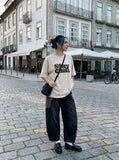 DAXUEN light beige oversized bold graphic t-shirt — model photo