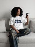 DAXUEN light beige oversized bold graphic t-shirt — model photo