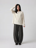 DAXUEN grey contrasting button henley long-sleeved top — model photo