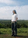 DAXUEN white contrasting letter embroidered crew neck T-shirt — model photo