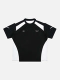 Black and white short sleeve t-shirt with contrasting shoulder panels and small chest graphics