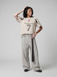 DAXUEN light beige contrasting-panel short-sleeve T-shirt — model photo