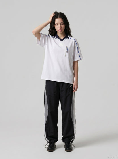 DAXUEN white and navy contrasting piped V-neck polo shirt — model photo