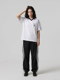 DAXUEN white and navy contrasting piped V-neck polo shirt — model photo
