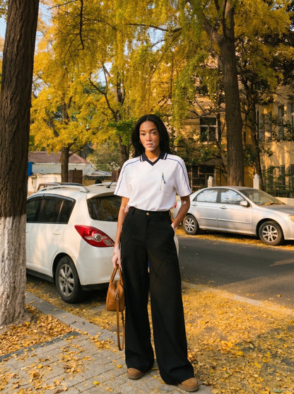 DAXUEN white and navy contrasting piped V-neck polo shirt — model photo