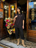 DAXUEN black oversized contrasting text blocks T-shirt — model photo