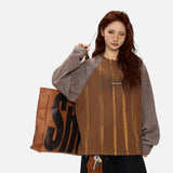 DAXUEN solid colour contrasting textured sleeve long-sleeve top