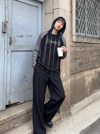 DAXUEN solid colour contrasting textured sleeve long-sleeve top — model photo