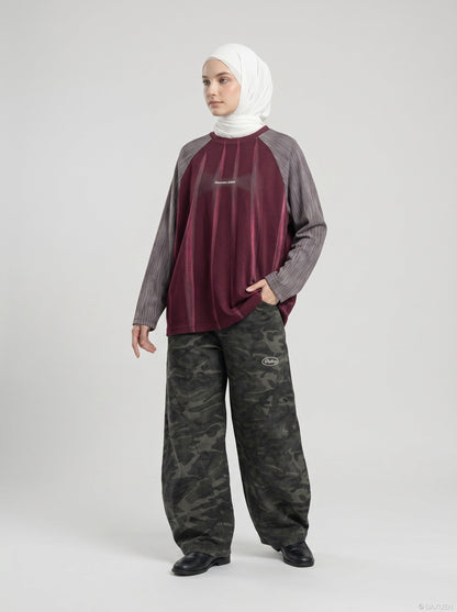 DAXUEN solid colour contrasting textured sleeve long-sleeve top — model photo