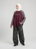DAXUEN solid colour contrasting textured sleeve long-sleeve top — model photo