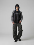 DAXUEN solid colour contrasting textured sleeve long-sleeve top — model photo
