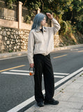 DAXUEN navy bomber jacket with convertible collar — model photo