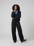 DAXUEN Black convertible wide-leg cargo pants — model photo