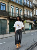 DAXUEN Oversized short-sleeve t-shirt with astronaut graphic — model photo