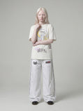 DAXUEN black yellow crescent moon graphic t-shirt — model photo