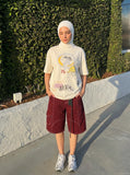 DAXUEN black yellow crescent moon graphic t-shirt — model photo