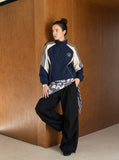 DAXUEN navy color block embroidered crest track jacket — model photo