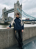 DAXUEN navy color block embroidered crest track jacket — model photo