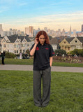 DAXUEN Men's loose-fitting polo shirt with red embroidery — model photo