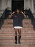 DAXUEN Men's loose-fitting polo shirt with red embroidery — model photo