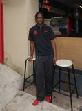 DAXUEN Men's loose-fitting polo shirt with red embroidery — model photo