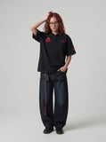 DAXUEN Men's loose-fitting polo shirt with red embroidery — model photo
