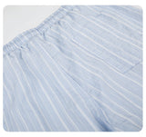 DAXUEN brown wide-leg trousers with vertical stripes and wooden bead details